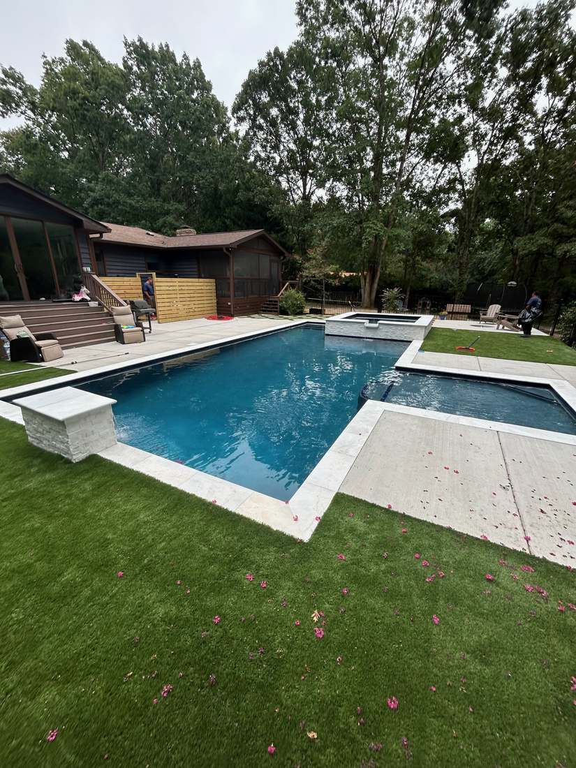 Finished pool and raised spa seen from the new lawn